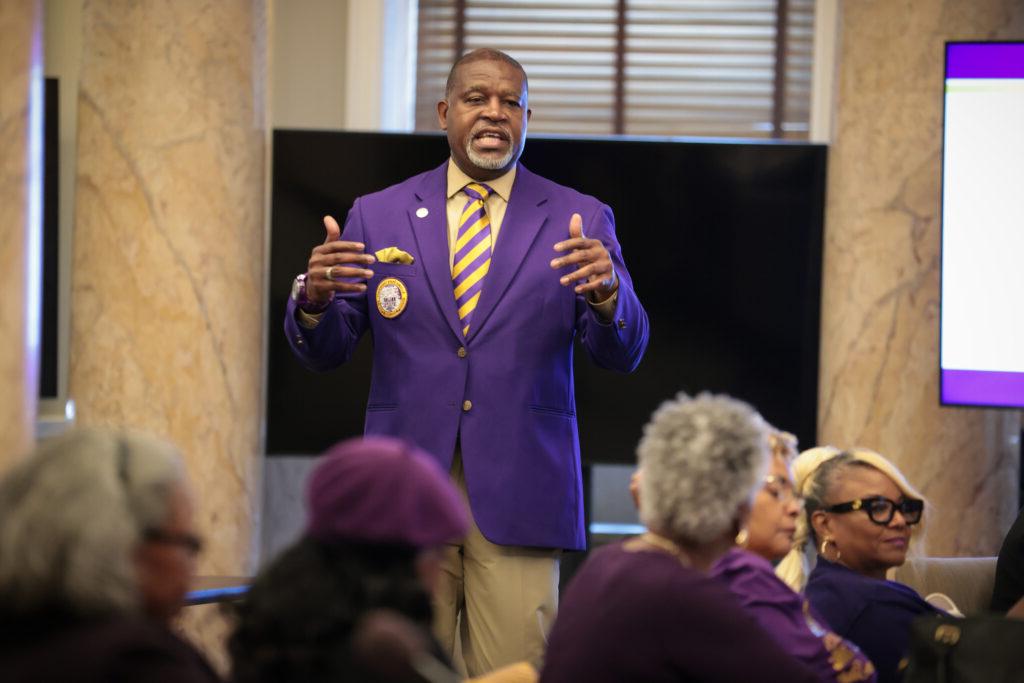 Dr. Tracy M. Cook, President of pg电子下载 State, speaks to a room of legislators, students, and alumni during Purple and Gold Day.